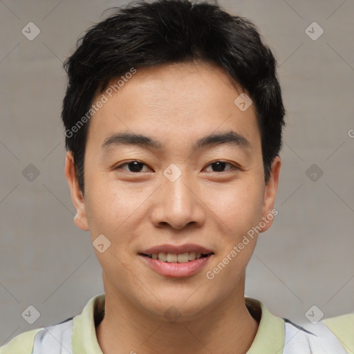 Joyful asian young-adult male with short  brown hair and brown eyes