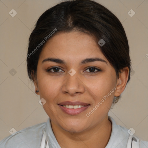 Joyful latino young-adult female with medium  brown hair and brown eyes