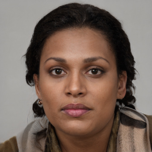 Neutral latino young-adult female with short  brown hair and brown eyes
