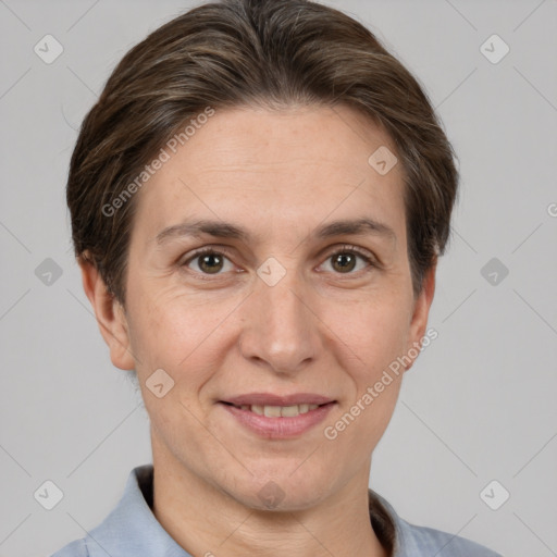 Joyful white adult female with short  brown hair and brown eyes