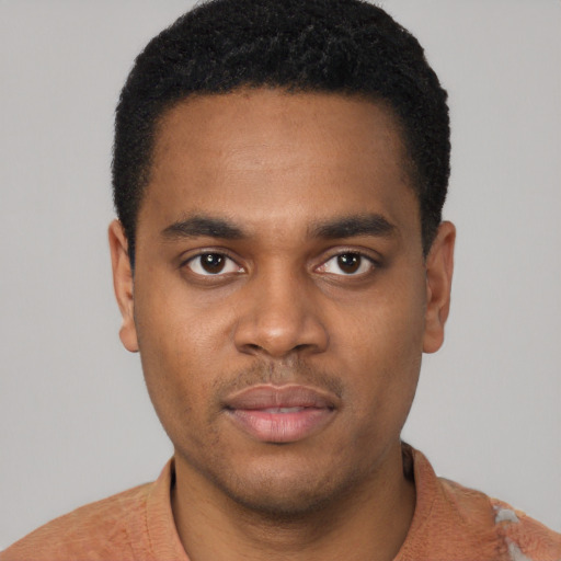 Neutral latino young-adult male with short  black hair and brown eyes