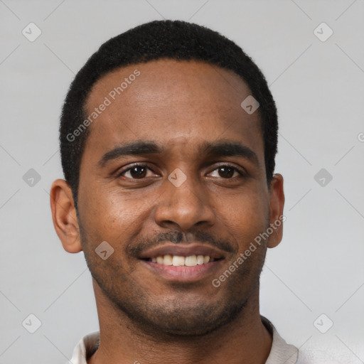 Joyful black young-adult male with short  black hair and brown eyes