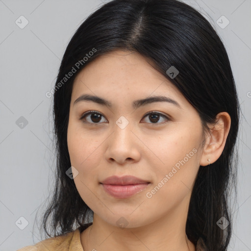 Joyful asian young-adult female with medium  black hair and brown eyes