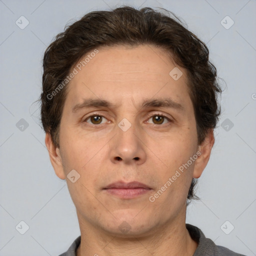 Neutral white adult male with short  brown hair and brown eyes