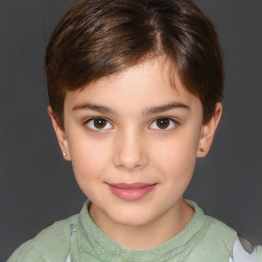 Joyful white child female with short  brown hair and brown eyes