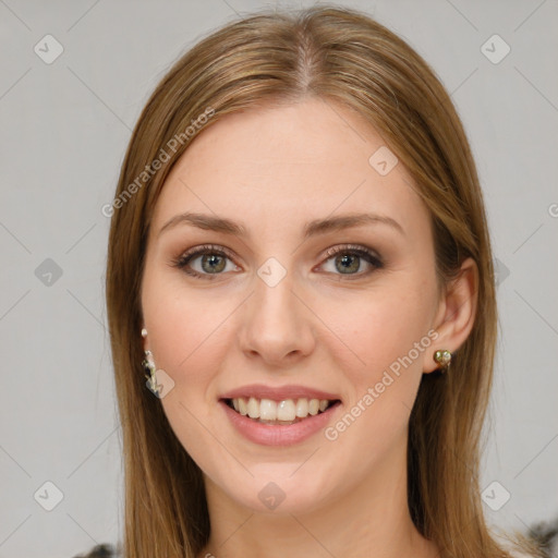 Joyful white young-adult female with long  brown hair and green eyes