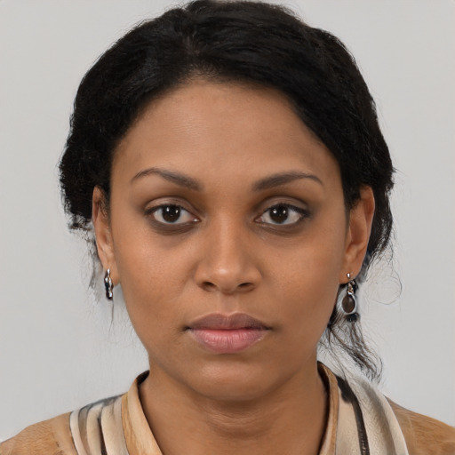 Neutral black young-adult female with medium  black hair and brown eyes