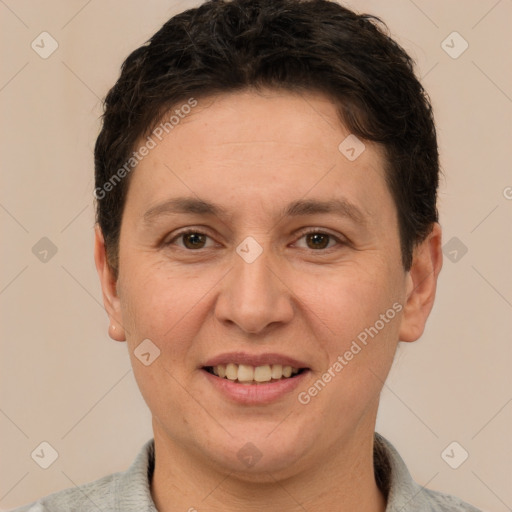 Joyful white adult female with short  brown hair and brown eyes