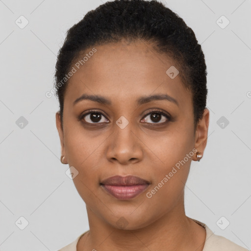 Joyful black young-adult female with short  brown hair and brown eyes