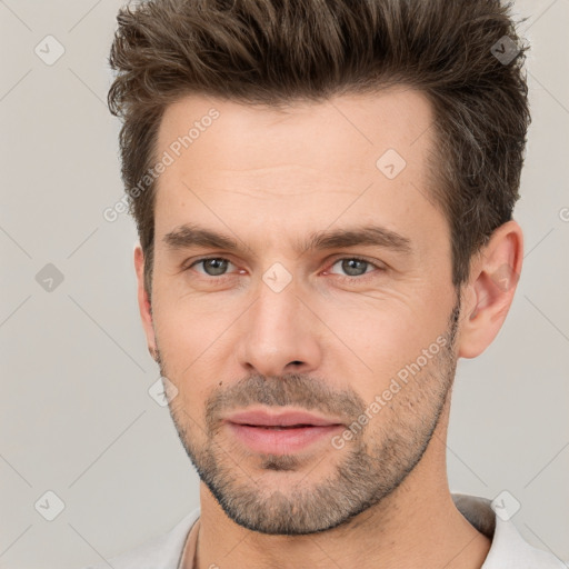 Neutral white young-adult male with short  brown hair and brown eyes