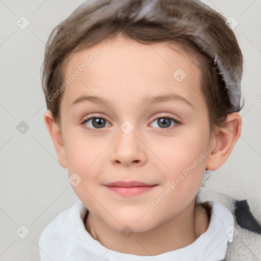 Joyful white child female with short  brown hair and grey eyes