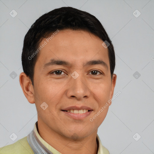 Joyful white young-adult male with short  black hair and brown eyes