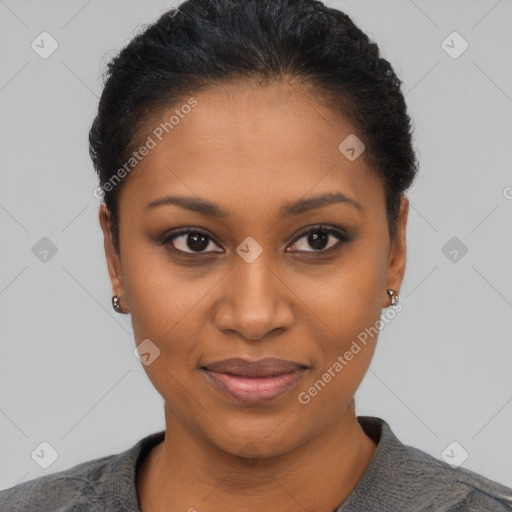 Joyful black young-adult female with short  black hair and brown eyes