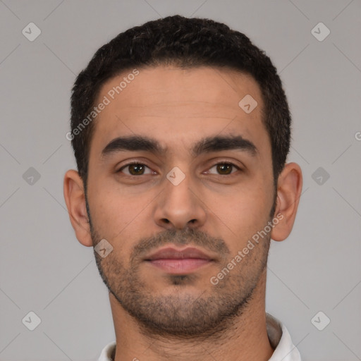 Neutral latino young-adult male with short  black hair and brown eyes