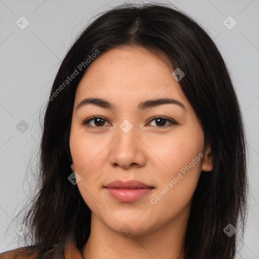 Joyful latino young-adult female with long  brown hair and brown eyes