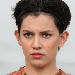 Neutral white young-adult female with short  brown hair and brown eyes