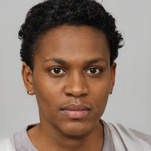 Neutral black young-adult female with short  brown hair and brown eyes