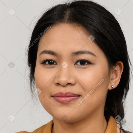 Joyful asian young-adult female with medium  brown hair and brown eyes