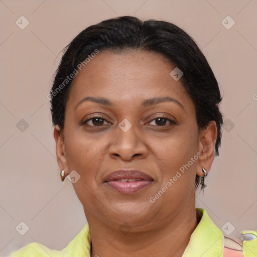 Joyful white adult female with short  brown hair and brown eyes