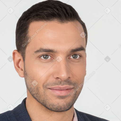 Joyful white young-adult male with short  brown hair and brown eyes