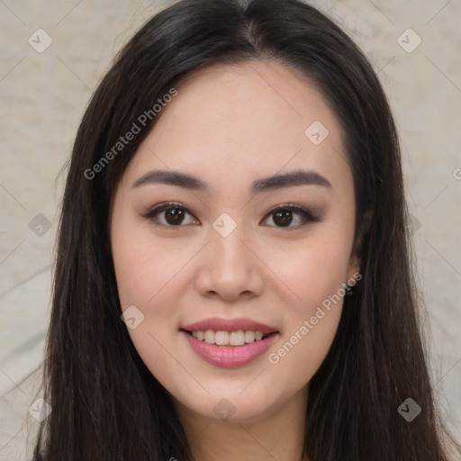 Joyful asian young-adult female with long  brown hair and brown eyes