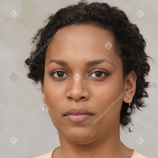 Neutral black young-adult female with short  brown hair and brown eyes