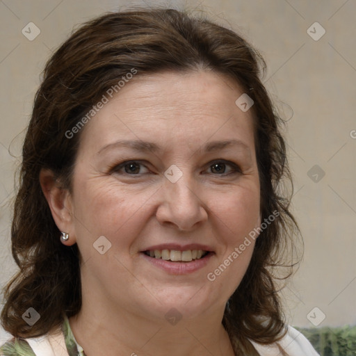 Joyful white adult female with medium  brown hair and brown eyes