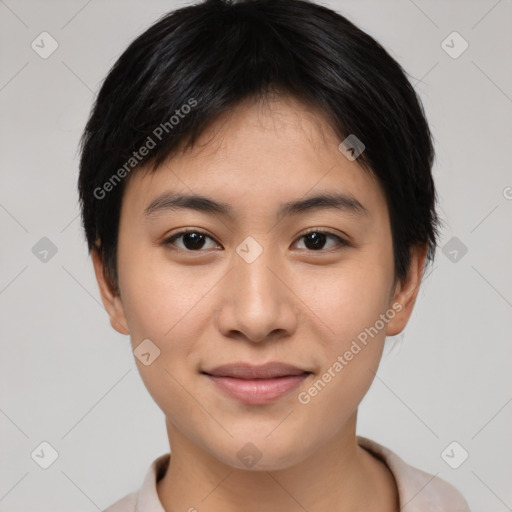 Joyful asian young-adult female with short  black hair and brown eyes