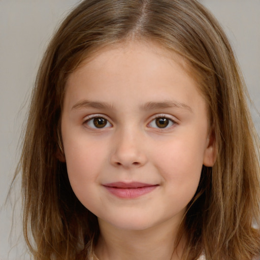 Joyful white child female with long  brown hair and brown eyes