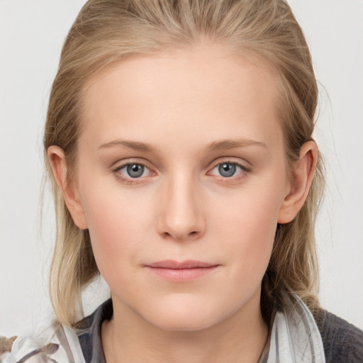 Neutral white young-adult female with medium  brown hair and blue eyes