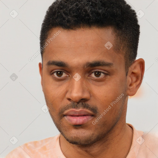 Neutral black young-adult male with short  black hair and brown eyes