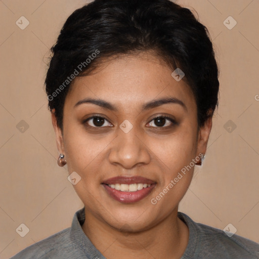 Joyful latino young-adult female with short  brown hair and brown eyes