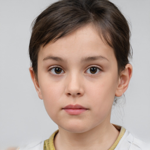 Neutral white child female with short  brown hair and brown eyes