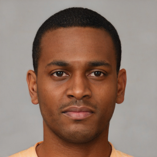 Neutral black young-adult male with short  brown hair and brown eyes