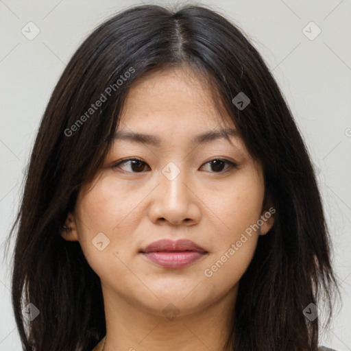 Joyful asian young-adult female with long  brown hair and brown eyes