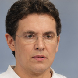 Neutral white adult male with short  brown hair and brown eyes