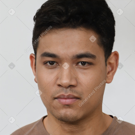 Neutral asian young-adult male with short  black hair and brown eyes