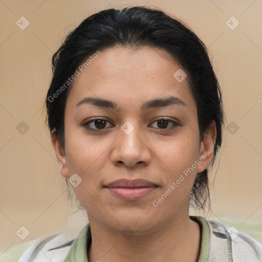 Joyful latino young-adult female with medium  brown hair and brown eyes