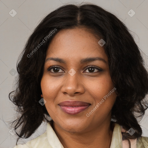 Joyful black young-adult female with medium  brown hair and brown eyes