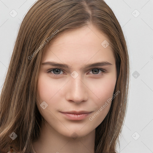 Neutral white young-adult female with long  brown hair and brown eyes