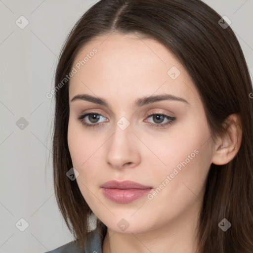 Neutral white young-adult female with long  brown hair and brown eyes