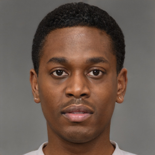 Neutral black young-adult male with short  brown hair and brown eyes