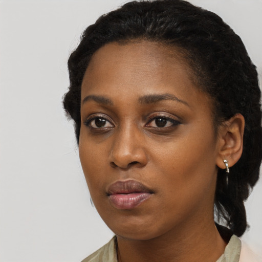 Neutral black young-adult female with long  black hair and brown eyes