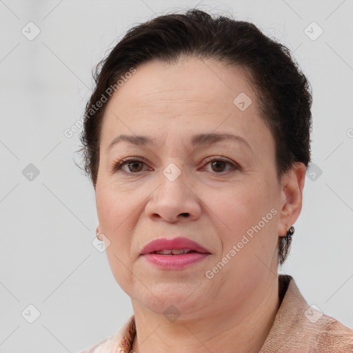 Joyful white adult female with short  brown hair and brown eyes