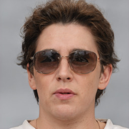 Neutral white adult female with medium  brown hair and brown eyes