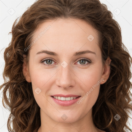 Joyful white young-adult female with long  brown hair and green eyes