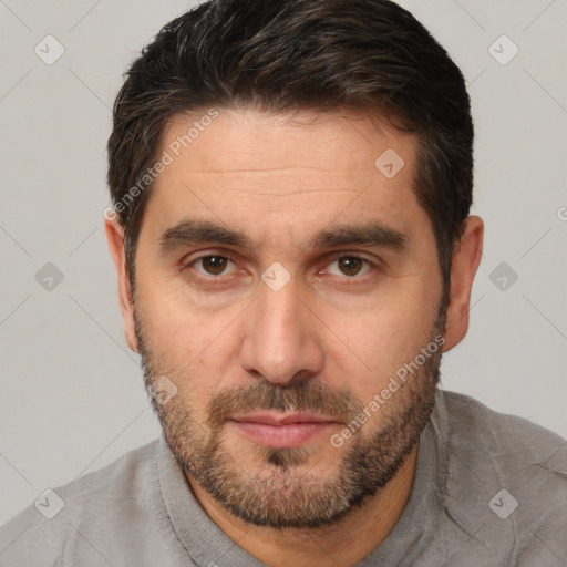 Neutral white adult male with short  brown hair and brown eyes