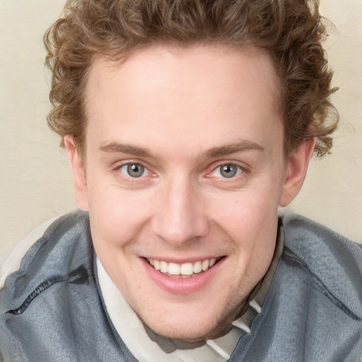 Joyful white young-adult female with short  brown hair and blue eyes