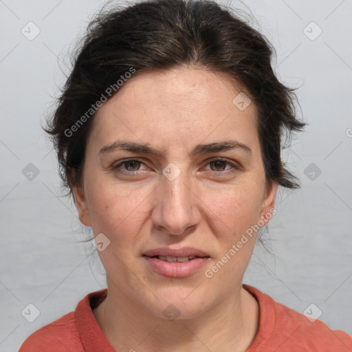 Joyful white adult female with medium  brown hair and grey eyes