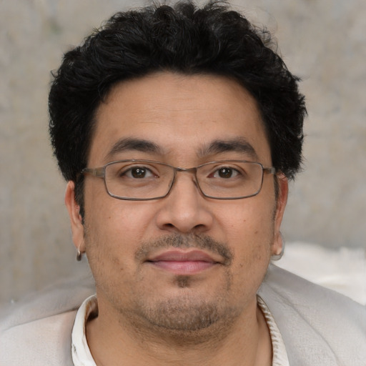 Neutral asian adult male with short  black hair and brown eyes